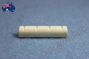 UKULEL Guitar Nut Slotted 4 String Bridge Nut Ivory ABS UKULELE Guitar NEW AU - Picture 1 of 7