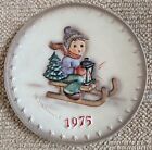 Plate for the year 1975.  Boy sledging.  German
