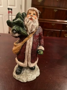 8" Resin Santa holding Christmas Tree - Picture 1 of 2