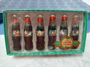 EVOLUCIÓN DE LA COCA COLA SANTA 6 ADORNOS COLECCIONABLES BOTELLA COCA COLA SERIE UNO - Imagen 1 de 11