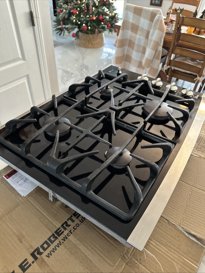 GE Profile 30" Gas Vidrio Quemadores Laterales Controles Inoxidable Jgp940sek2ss Foto 1 de 4