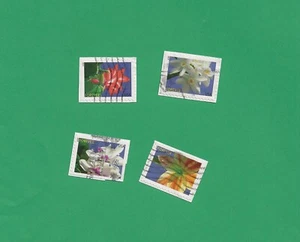 USA Winter Flowers set of 4 used on paper. - Picture 1 of 1