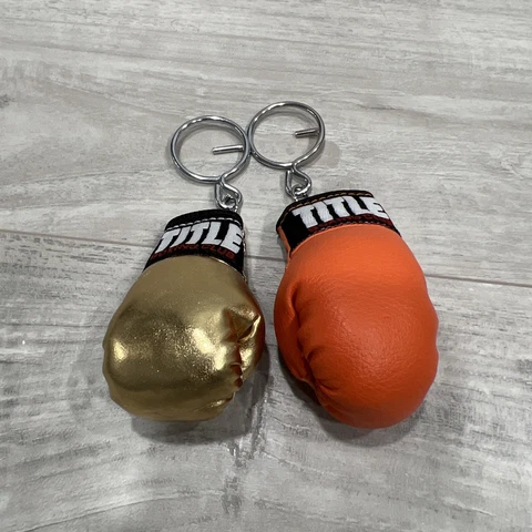 Title Boxing Club Keychains Gold And Orange Cover