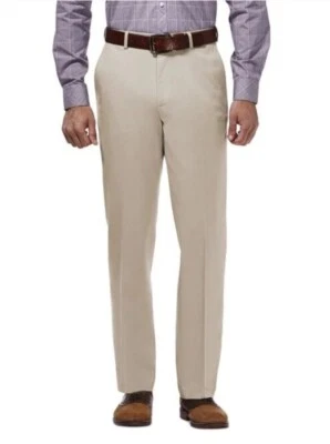 Pantalones de vestir Haggar para hombre calce clásico premium sin hierro caqui 42W x 30L color arena Foto 1 de 4