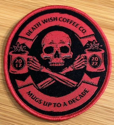 Death Wish Coffee Co. Patch - Mugs Up To A Decade 2012-2022 - Red & Black - NEW - Image 1 of 2