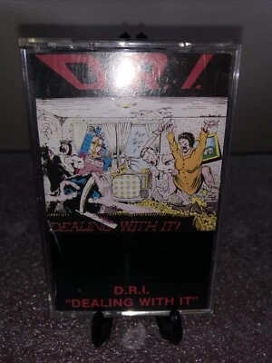D.R.I. “Dealing With It” - Image 1 of 2