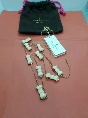 Collar largo Kate Spade New York Take A Bow oro marfil talla 31" Foto 1 de 4