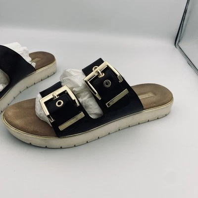 Sandalias Louise et Cie Lairde Slide negras con hebillas doradas en suelas blancas 8M Foto 1 de 4