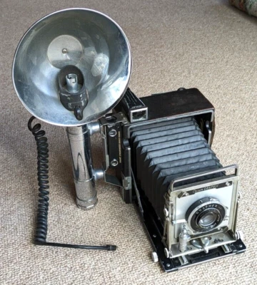 Lente Graflex Crown Graphic 4x5, Optar 135mm, flash síncrono Heiland e lâmpadas - Imagem 1 de 4