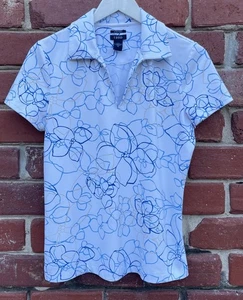 Izod Golf Damen Gr. Medium Kurzarm Kragen Golftop X-tra Dry weiß geblümt - Bild 1 von 8