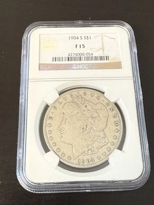 1904 S NGC F 15 Morgan Silver Dollar. - Image 1 of 2