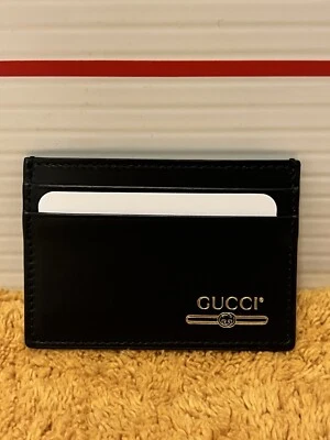 Auténtico Tarjetero Gucci Negro y Dorado Doble Cara Diseñador Cuero Nuevo Foto 1 de 2