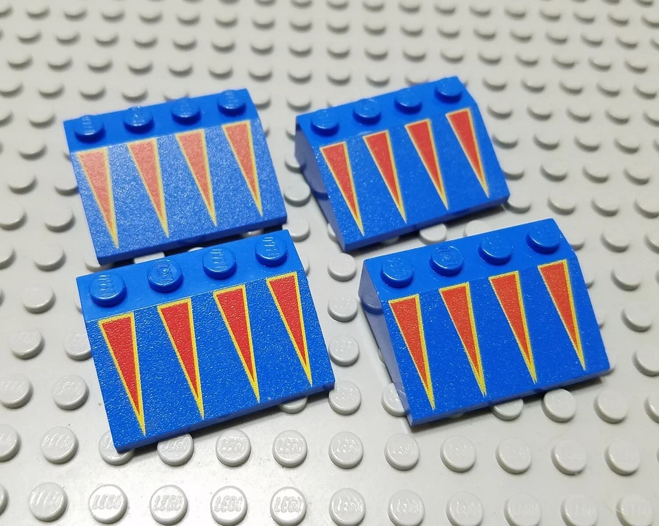 LEGO Lot of 4 Blue 3x4 Roof Slopes with Red Triangles - Image 1 of 1