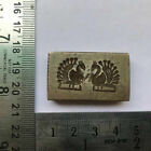 An antique old bell metal jewellery stamp die seal peacock pattern