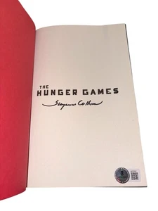 Author Suzanne Collins Signed Autograph The Hunger Games Hardcover Book Beckett - Picture 1 of 4