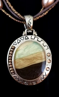 **Collar colgante Kenneth Cole tono dorado de varias filas** Foto 1 de 4