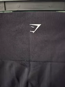 Leggings neri senza cuciture GymShark Energy taglia XSmall allenamento corsa yoga traforati - Foto 1 di 13