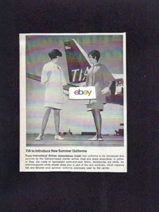 TIA TRANS INTERNATIONAL OAKLAND AIRPORT NUOVO F/A UNIFORMI ESTIVE 1968 FOTO - Foto 1 di 1