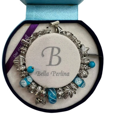 Pulsera Bella Perlina Tono Plata Dijes En Caja Vacaciones Crucero Tropical Foto 1 de 4