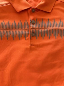 Polo de golf Adidas grande para hombre naranja y gris gráfico bordado logotipo y aberturas laterales - Imagen 1 de 8