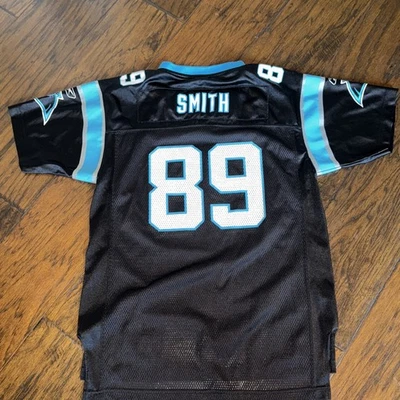 Camiseta Steve Smith #89 Carolina Panthers Reebok Negra Juvenil Grande XL De Colección Foto 1 de 4