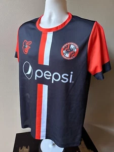 Camiseta deportiva para hombre Baltimore Orioles Birdland FC#22 SGA estadio de fútbol negra/naranja - Imagen 1 de 5
