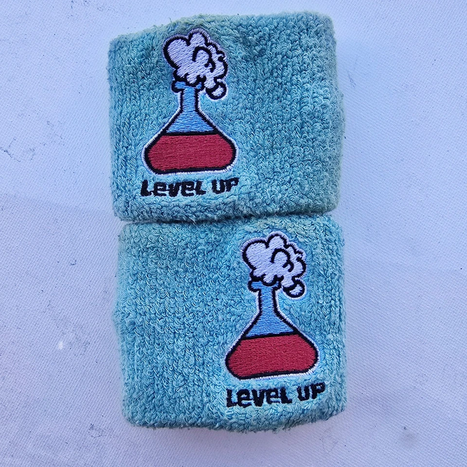 Juego de 2: Pulsera Nintendo vintage de nivel Foto 1 de 2