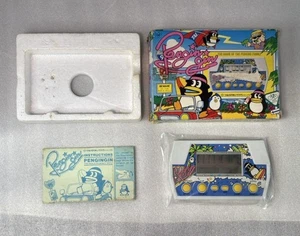 Vintage Takara Toku Toys LCD Spiel Pengin Gin Pinguin Familie 1980er Japan OVP - Bild 1 von 6