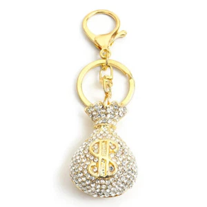 Llavero colgante con incrustaciones de diamantes de imitación con letrero de dólar de la suerte de cristal - Imagen 1 de 6