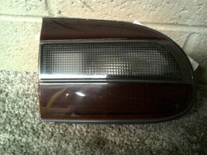 DRIVER LEFT TAIL LIGHT LID MOUNTED FITS 93-97 PRIZM 9050 - Picture 1 of 3