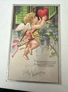 Embossed Valentines Day Postcard  Cupid Cherub Lifting Heart Through Window - Picture 1 of 2