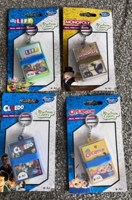 hasbro keyring games pocket mini size monopoly  cluedo operation travel - Image 1 of 4