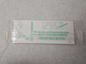 1987 Kellogg’s Cereal Premium Mammoth Paw Prints Stick Sheets Green Sealed NOS - Picture 1 of 2