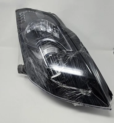 Depo Blacked Out Bi-Xenon Projector Headlight - PASSENGER - Nissan 350Z Z33 - Image 1 of 4
