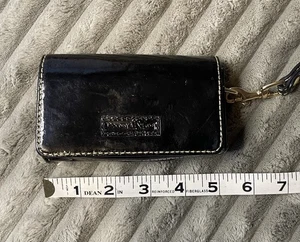 Dooney and Bourke schwarzes Leder-Lippenstiftetui mit Doppelfaltung und Spiegel Schlüsselanhänger - Bild 1 von 6