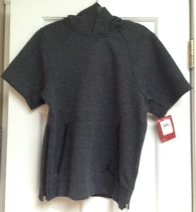 CHAQUETA CON CAPUCHA NEGRA JASPEADA MANGA CORTA NIKE JUMPMAN NIÑOS NUEVA CON ETIQUETAS TALLA MEDIANA $70 - Imagen 1 de 2