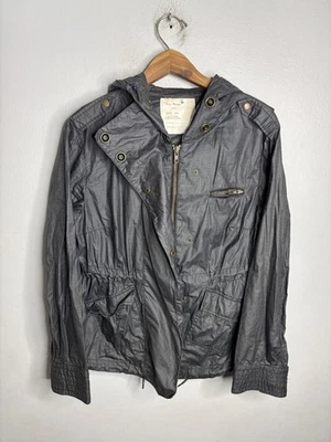 Chaqueta cortavientos ligera Free People para mujer gris mediana con capucha cremallera frontal Foto 1 de 4