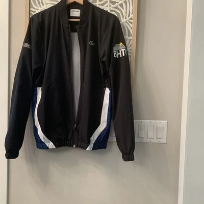 Chaqueta cortavientos atlética Lacoste Sport negra azul con cremallera completa para hombre pequeña  Foto 1 de 4