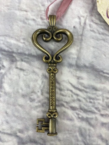 Large Metal Brass Skeleton Key 3 1/2"  COMPASSION Ornate Unique Family Values Cover