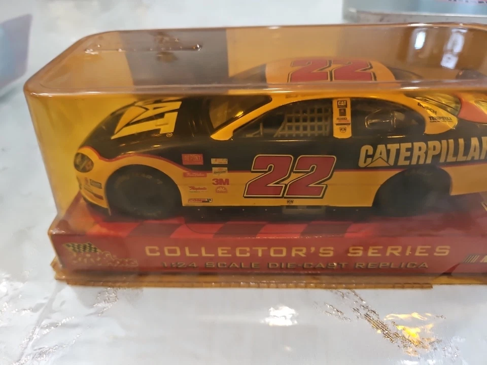 Racing Champions 2003 NASCAR Silver Chrome #22 Ward Burton Caterpillar Premier Chase 1:24 Diecast Car