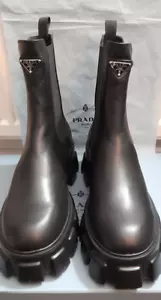 Stivali Prada, misura 43/28cm, usati con difetto - Foto 1 di 7
