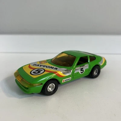 Vintage Corgi Toys Green Ferrari Daytona 1:36 Scale Race Car Doors Open Green - Image 1 of 4