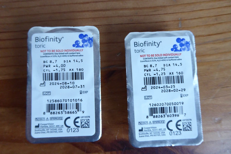 2 Torische Monatslinse Biofinity  -4,75 -4,00 /CYL -1,25 -1,75 MHD 28  Neu - Bild 1 von 3