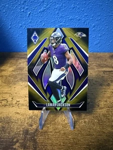 Panini Phoenix 2024 - Lamar Jackson #102 dorado y negro/125 - Imagen 1 de 2