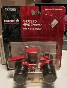 Ertl Case IH STX375 4WD Traktor mit Triples 1/64 - Bild 1 von 6