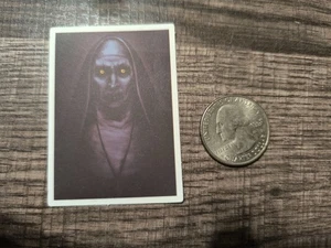 The Conjuring Nun Sticker Halloween Free USA S&H Horror Yellow Eyes Creepy Scary - Picture 1 of 3