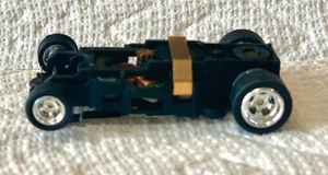 RUEDAS CROMADAS AW NEUMÁTICOS NEGROS 4 VELOCIDADES RANURA COCHE CHASIS - Imagen 1 de 1