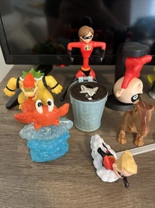 McDonald’s Happy Meal gemischtes Chara Set Disney 12 Stück: Mario, Incredibles, Buzz - Bild 1 von 3