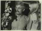 Press Photo Man Demonstrates Hand Puppet To Young Girl - Sap40701
