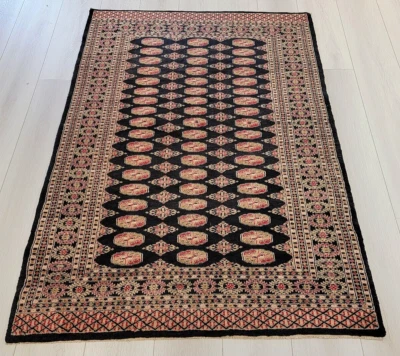 Alfombra oriental paquistaní de lana multicolor anudada a mano de 4'2" x 6' Foto 1 de 4